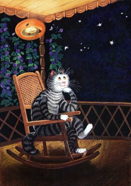 Кот в кресле качалке